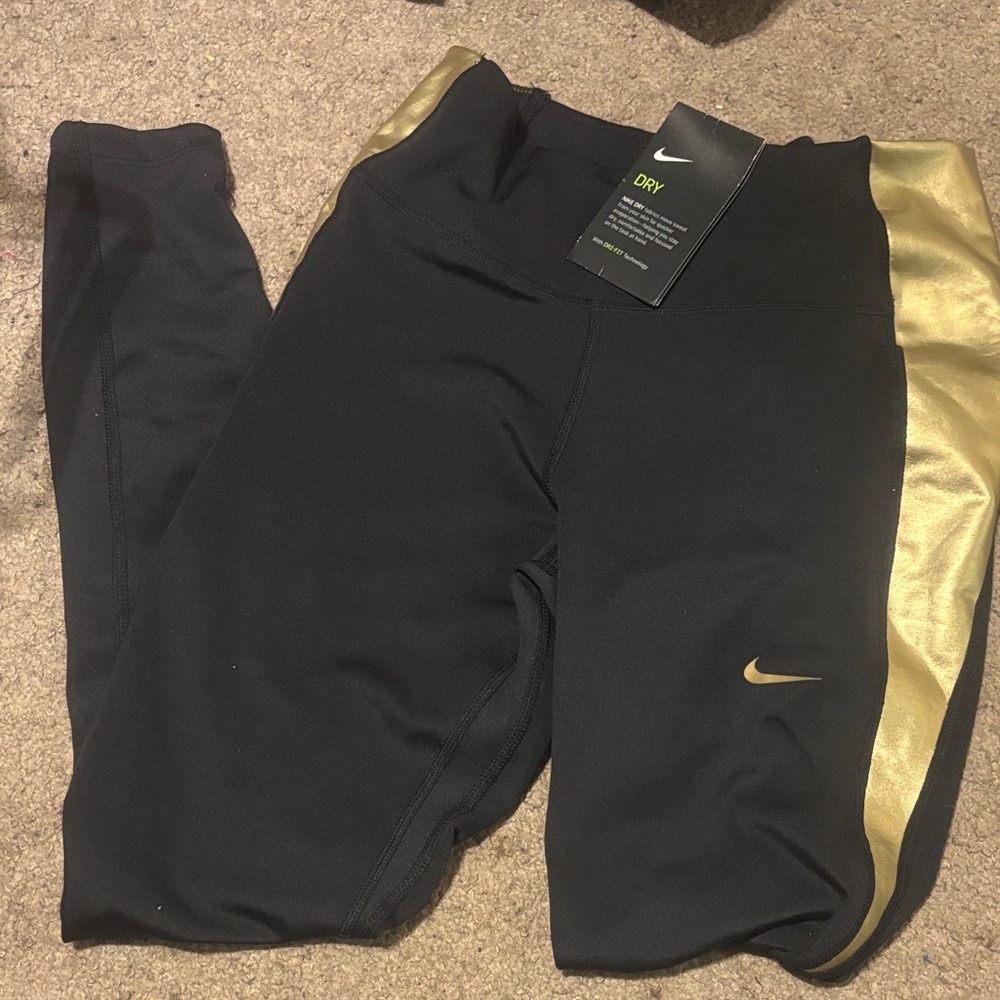 Nike Women's Black and Gold Leggings